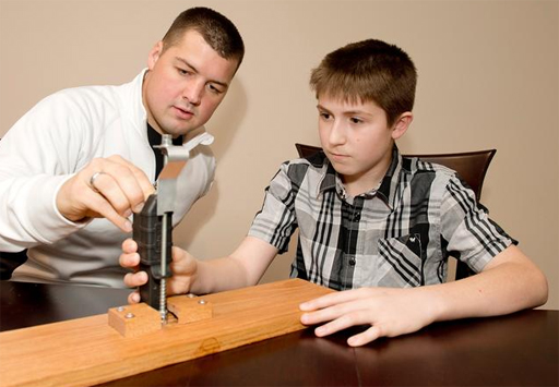 Scout develops device to make reloading gun easier