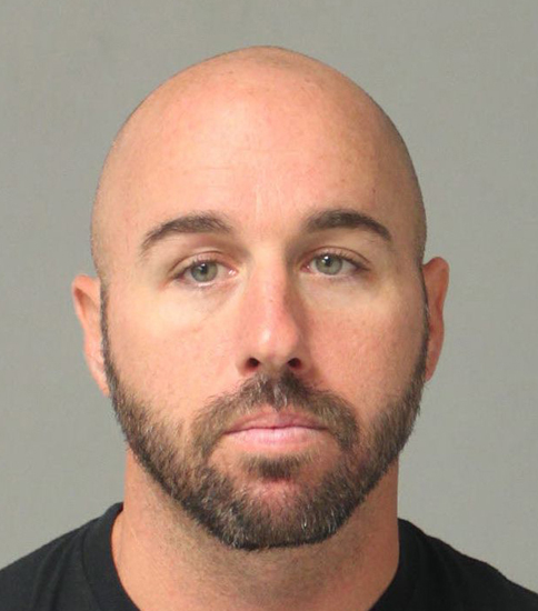 Police: Md. man ordered pit bull to attack dog, head-butted its owner