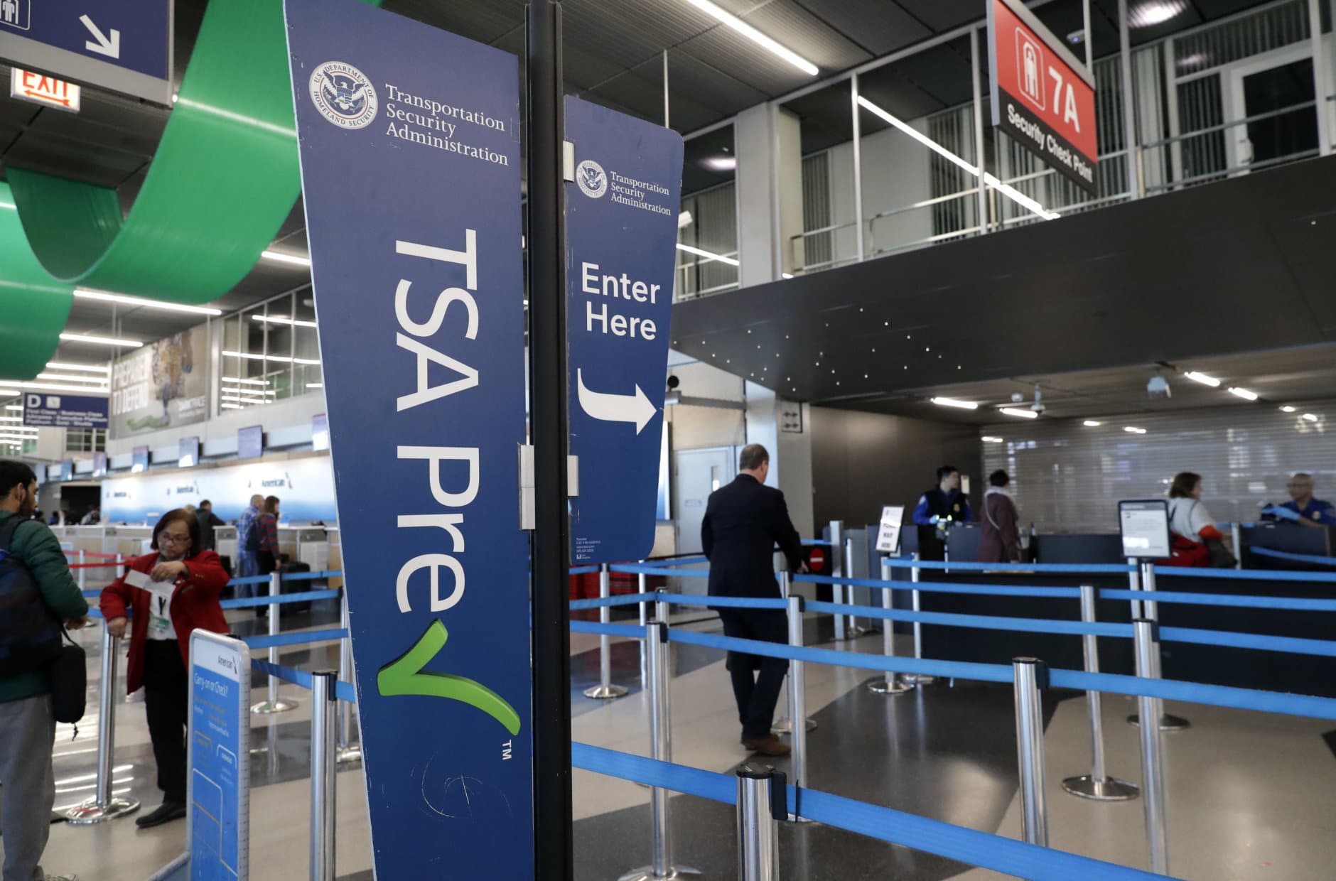 Transportation Security Administration checkpoint sign displays at O'Hare airport in Chicago, Saturday, Jan. 5, 2019. The TSA acknowledged an increase in the number of its employees calling off work during the partial government shutdown. (AP Photo/Nam Y. Huh)