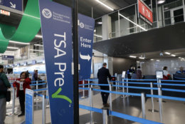 Transportation Security Administration checkpoint sign displays at O'Hare airport in Chicago, Saturday, Jan. 5, 2019. The TSA acknowledged an increase in the number of its employees calling off work during the partial government shutdown. (AP Photo/Nam Y. Huh)