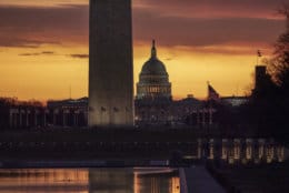 The Capitol and Washington Monument are seen at dawn as the partial government shutdown lurches into a third week with President Donald Trump standing firm in his border wall funding demands, in Washington, Monday, Jan. 7, 2019. After no weekend breakthrough to end a prolonged shutdown, newly empowered House Democrats are planning to step up pressure on Trump and Republican lawmakers to reopen the government. (AP Photo/J. Scott Applewhite)