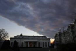 A cloud passes over the West Wing of the White House at sunset, Tuesday Jan. 8, 2019, a few hours before President Donald Trump is scheduled to make an address to the nation in Washington. (AP Photo/Jacquelyn Martin)