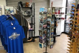  At Cathedral Pharmacy, two workers were busy filling prescriptions, but the counter where passers-by might purchase snacks or tourist memorabilia stood empty. (WTOP/Kristi King)
