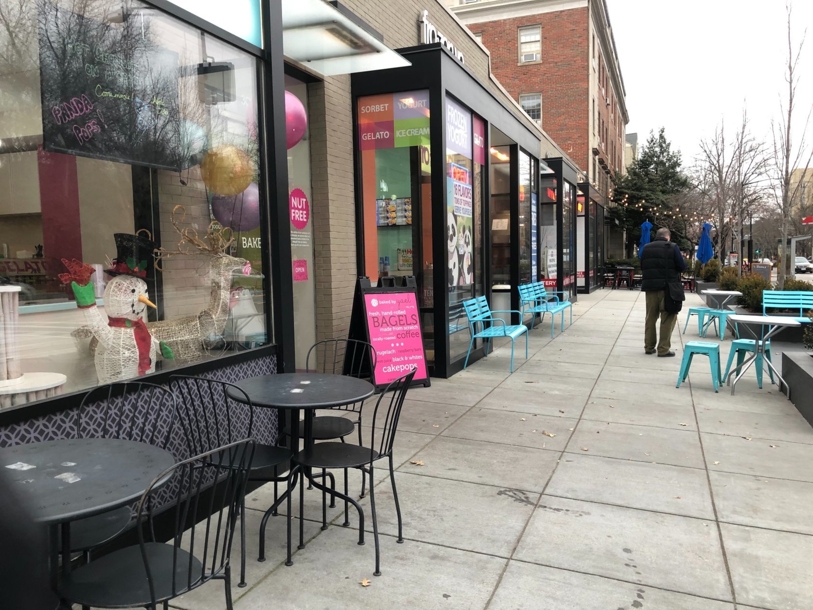 "We went from having thousands of people every day for Zoo Lights in December to having nobody in January," said Yael Krigman, of nearby shop Baked by Yael, while looking around at empty bistro tables. (WTOP/Kristi King)