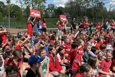Arlington elementary schoolers cheer on the Washington Capitals during playoff pep rally
