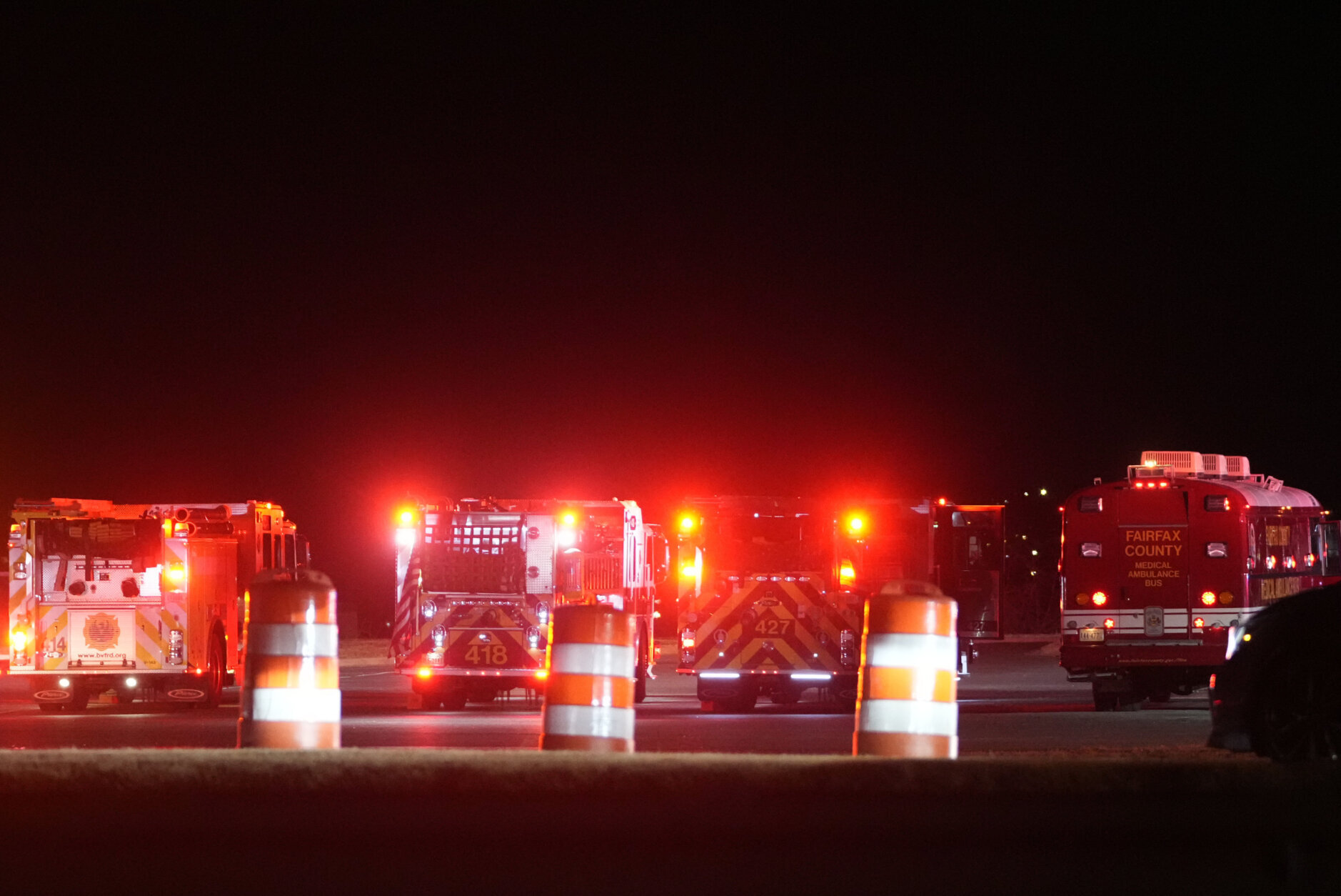 Fire trucks and road barrels