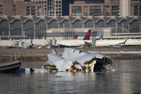‘Coated with jet fuel’: How first responders dealt with hazardous conditions at the site of Reagan National plane crash