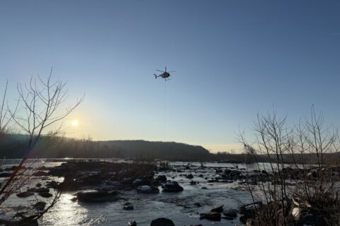 Helicopters over the Potomac River aren’t rescuing people, they’re dropping off drilling crews