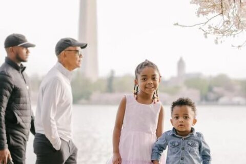 Fmr. President Barack Obama accidentally photobombs family photoshoot at the Tidal Basin