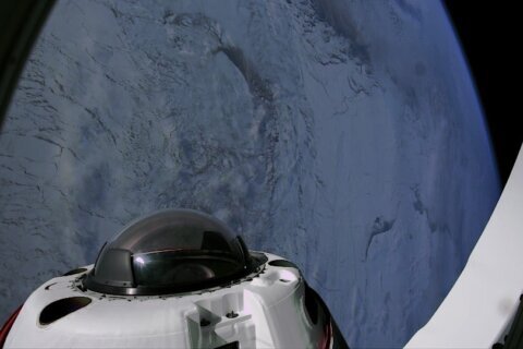 Four space tourists return to Earth after a private flight over the poles