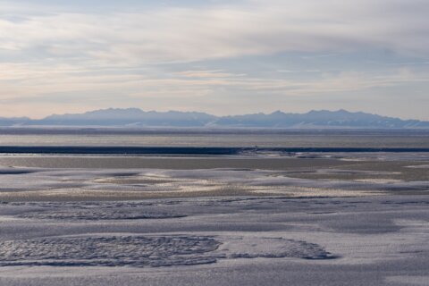 Trump officials are visiting Alaska to discuss a gas pipeline and oil drilling