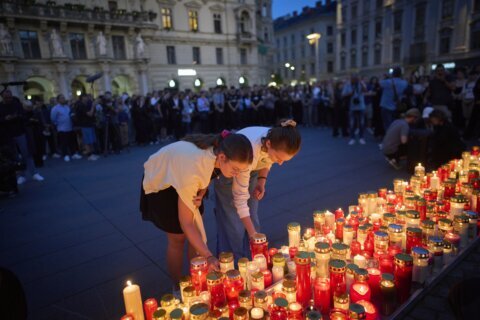 Austria falls silent for a minute as questions remain about the motive for a deadly school shooting